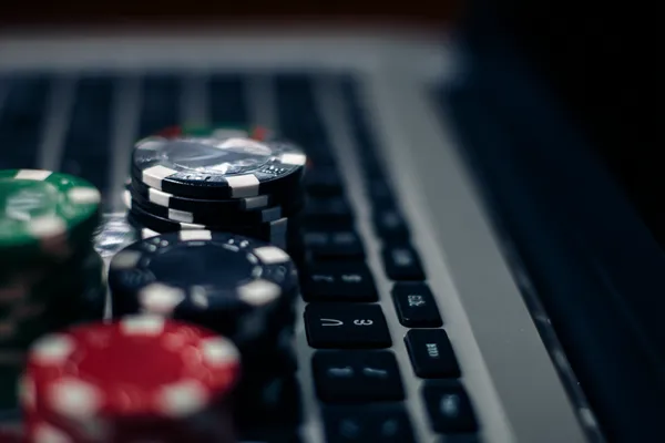 D63 Jackpot Slots — Spin for massive rewards A dramatic shot of winning sevens landing on a slot reel surrounded by shining gold coins, symbolizing big wins.